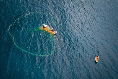 High angle view of man kayaking in sea