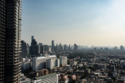 Modern buildings in city against sky