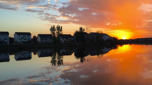 Scenic view of lake at sunset