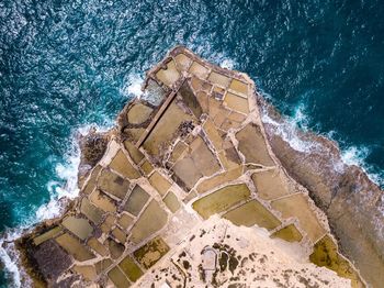 Aerial view of landscape by sea