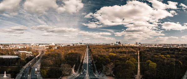 High angle view of bridge over cityscape against sky