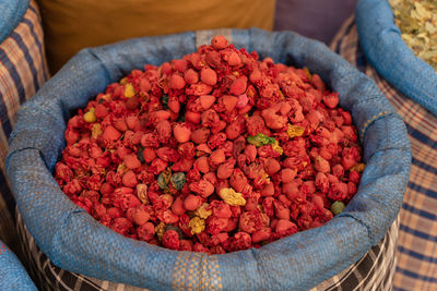 High angle view of red chili peppers in market