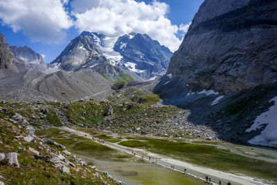 Scenic view of snowcapped mountains against sky