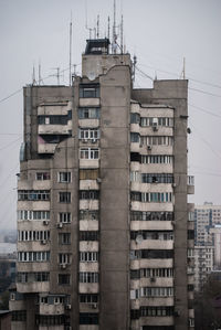 Low angle view of buildings against sky in city