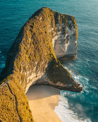 High angle view of rock formation in sea