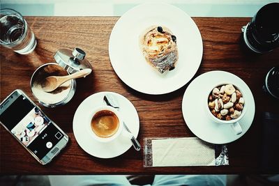 Directly above shot of coffee cup on table