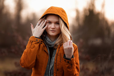 Young woman standing outdoors