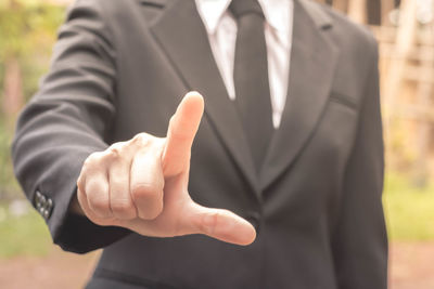 Close-up of man hand with text