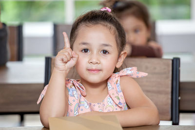 Portrait of cute girl smiling