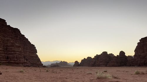 View of rocks against clear sky