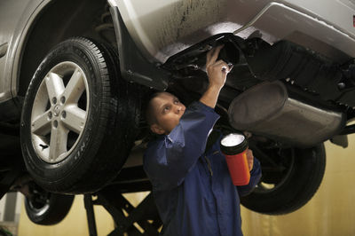 Man working in car