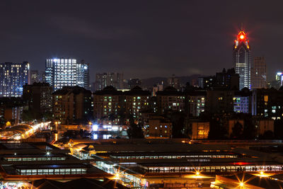 High angle view of illuminated city at night
