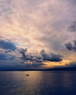 Scenic view of sea against sky at sunset