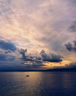 Scenic view of sea against sky at sunset
