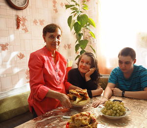 Happy friends on cutting board