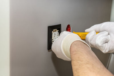 Close-up of man working at home