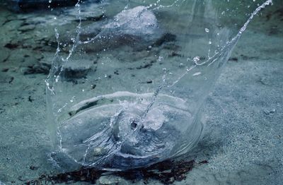 Close-up of ice splashing in sea