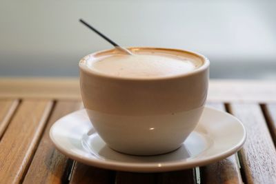 Close-up of cappuccino on table