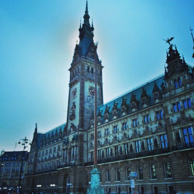 LOW ANGLE VIEW OF CLOCK TOWER