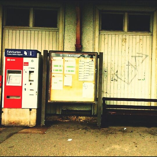 architecture, text, built structure, building exterior, door, western script, closed, communication, entrance, window, house, no people, graffiti, wall - building feature, non-western script, day, information sign, outdoors, wall, capital letter