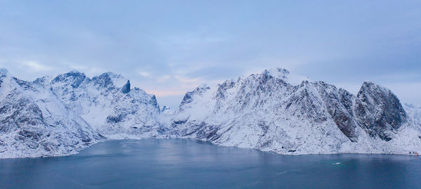 Scenic view of frozen lake against sky