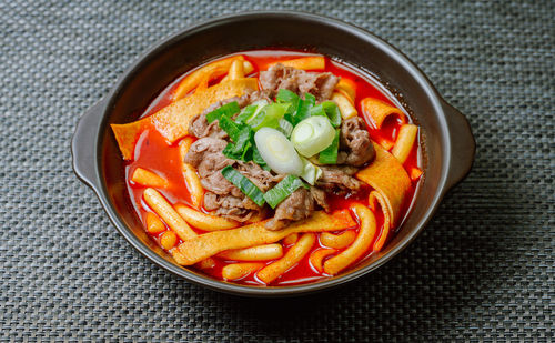 High angle view of food in bowl on jute