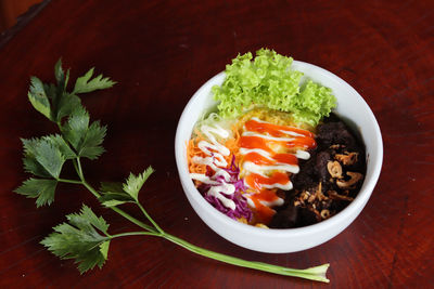 High angle view of vegetables in bowl on table