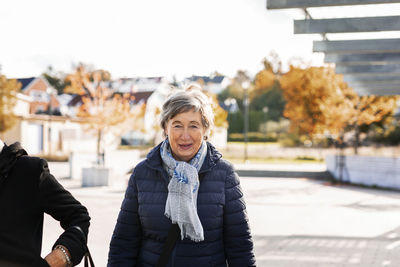 Senior woman at station