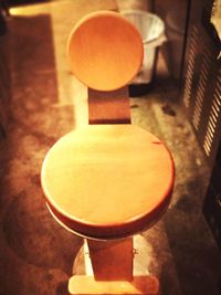 Close-up of illuminated lamp on table