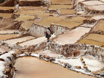 High angle view of man standing on landscape