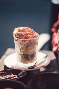 Close-up of ice cream in glass on table