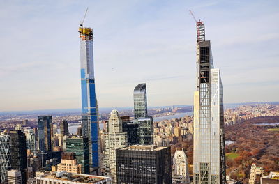 Modern buildings in city against sky