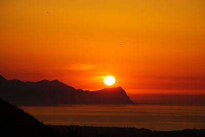 Silhouette of mountains at sunset