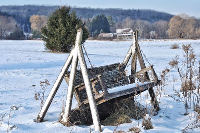 Built structure on snow covered field