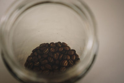 Close-up of coffee in jar on table