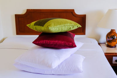 Close-up of pillow on bed at home