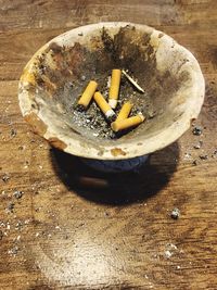 Close-up of cigarette on table