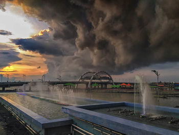 Panoramic shot of storm clouds over water