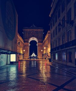 Illuminated buildings in city at night