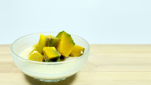 Close-up of fruits in bowl on table