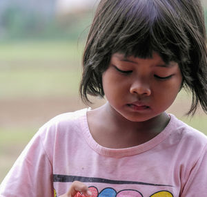 Close-up of girl looking away