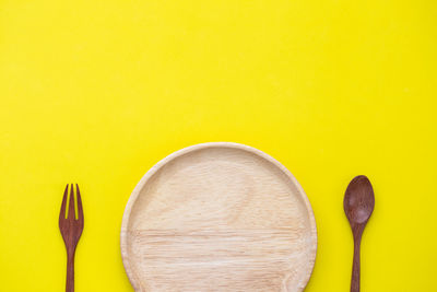 Directly above shot of yellow slices on table