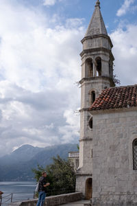 View of building against cloudy sky