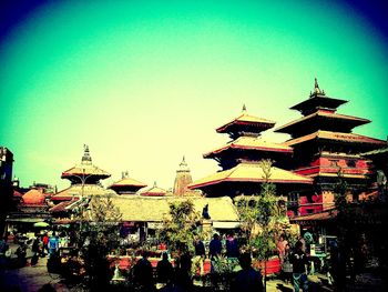 Low angle view of built structure against clear blue sky