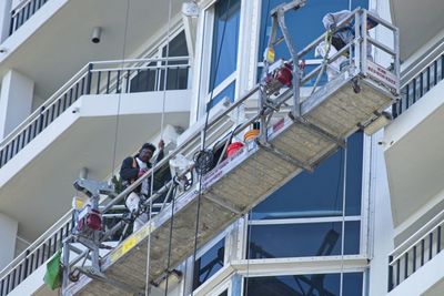 Low angle view of people on building