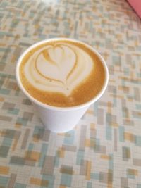 High angle view of cappuccino on table