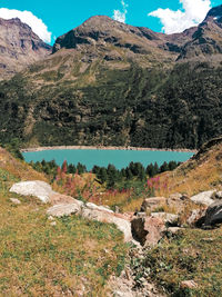 Scenic view of landscape and mountains against sky