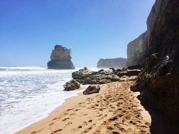 Panoramic view of beach against blue sky