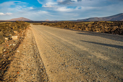 Surface level of road against sky