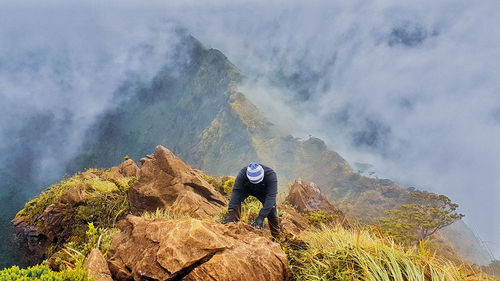 High angle view of hiker hiking on mountain